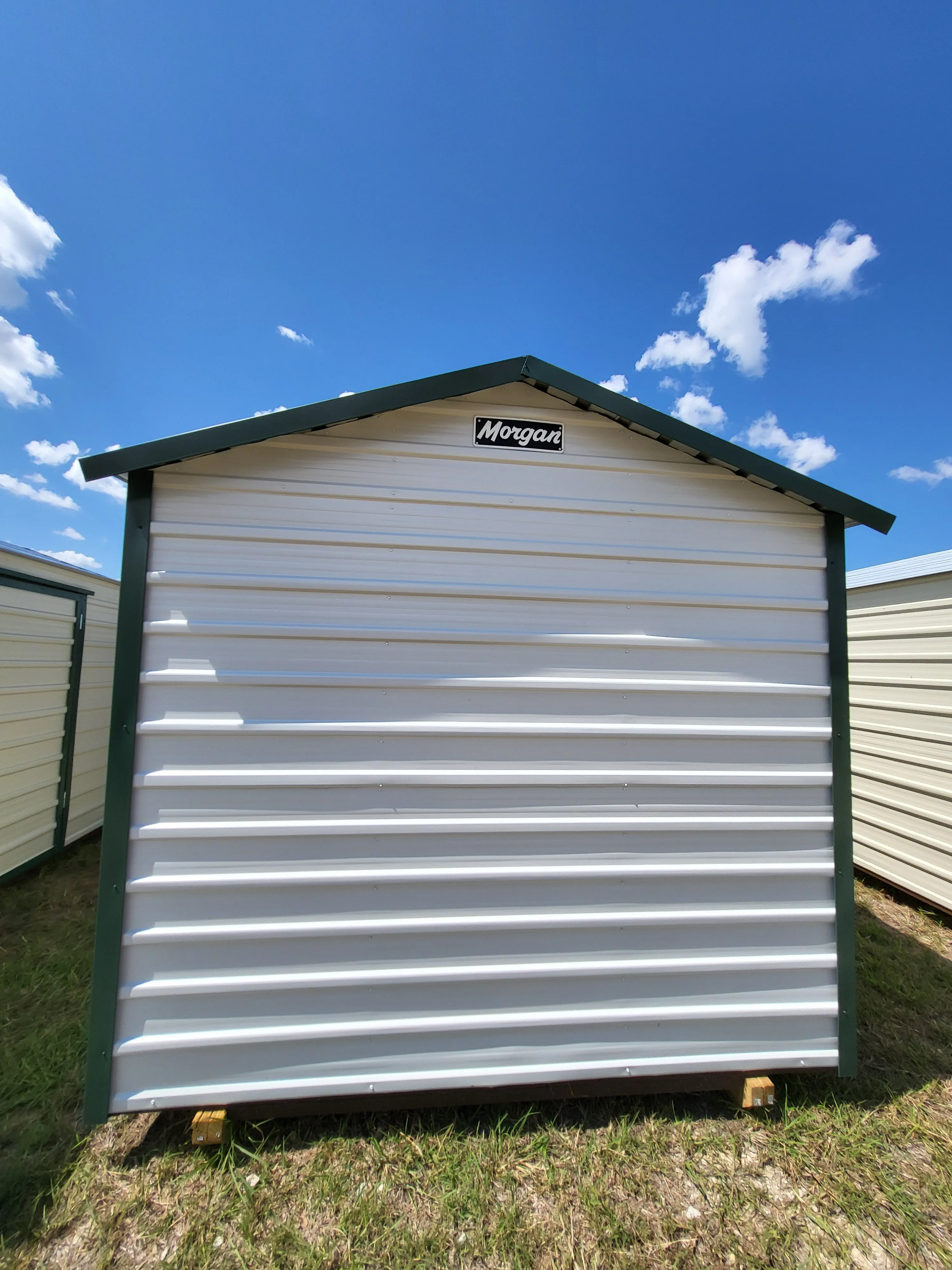 08 x 10 White Steel Shed with Green Trim