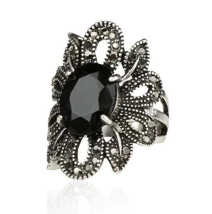 Elevate Your Style with the Women's Hollow Flower Black Crystal Ring 💎
