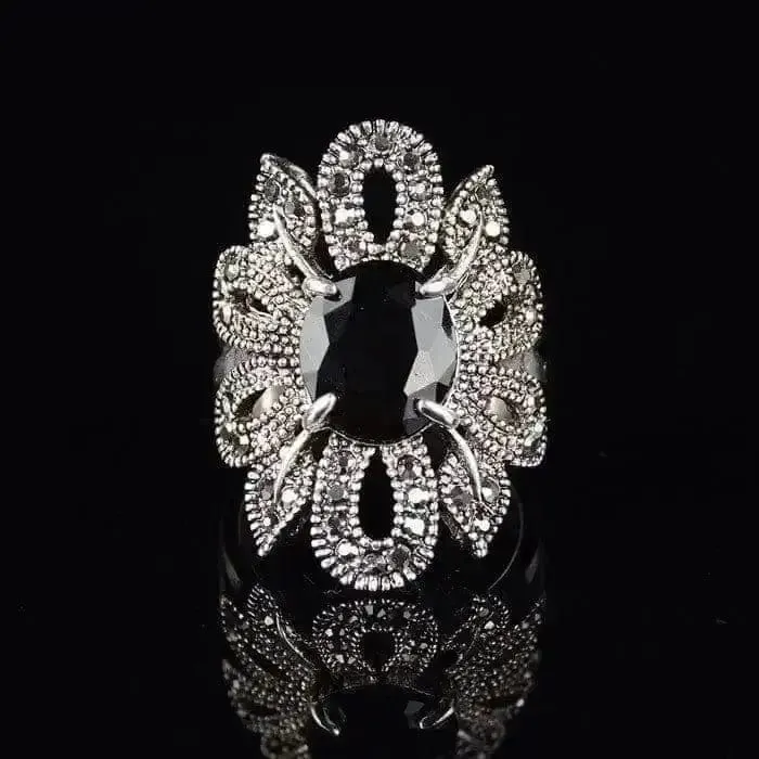 Elevate Your Style with the Women's Hollow Flower Black Crystal Ring 💎