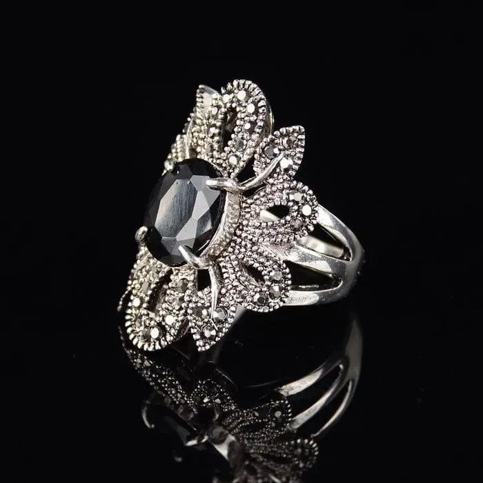 Elevate Your Style with the Women's Hollow Flower Black Crystal Ring 💎