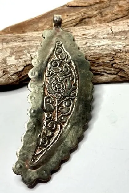 Large Turquoise Bone Carved Pendant on Tibetan Silver