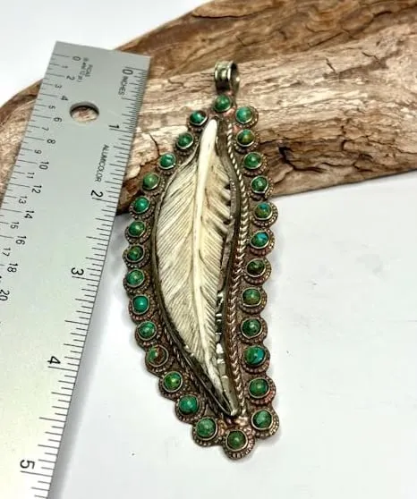Large Turquoise Bone Carved Pendant on Tibetan Silver